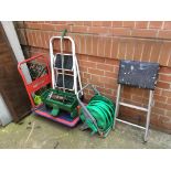 A trolley, hose and steps etc.