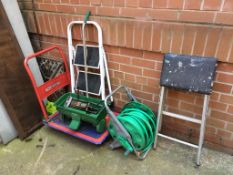 A trolley, hose and steps etc.