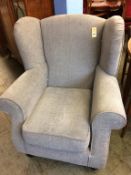A Wyvern grey armchair