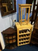 An oak table, kitchen trolley and a corner cabinet