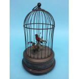 An Edwardian clockwork bird cage automation