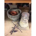 A garden urn and plant pots etc.