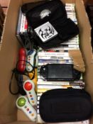 A quantity of X-Box games, Sony PSP's etc.