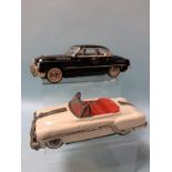 Two tin plate toy cars