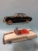 Two tin plate toy cars