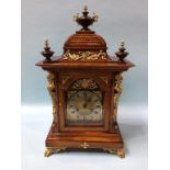 A walnut cased bracket clock, with 8 day movement and strike action, 55cm height