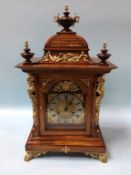 A walnut cased bracket clock, with 8 day movement and strike action, 55cm height