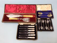 A cased set of silver spoons etc.