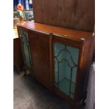 A walnut china cabinet