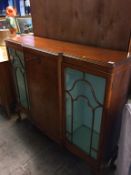 A walnut china cabinet