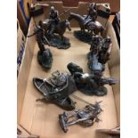 A collection of resin Indian figures