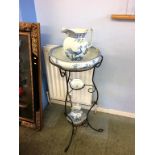 A metalwork stand to include a blue and white wash set