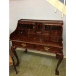 A reproduction mahogany ladies writing desk