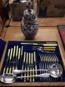 A canteen of cutlery and an Imari vase