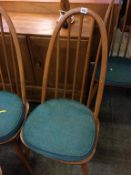 A set of six hoop back spindle chairs