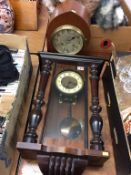 A mantle clock and a wall clock