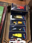 A collection of Die Cast toys and a tinplate van