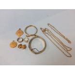 A collection of gold coloured jewellery