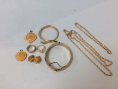 A collection of gold coloured jewellery