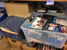 Three boxes of DVDs etc.