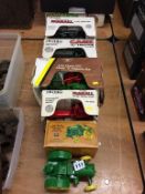 Three Die Cast ERTL tractors and two others