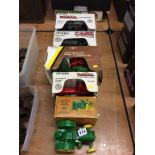 Three Die Cast ERTL tractors and two others