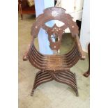 A Moorish/Middle Eastern 'X' framed chair, inset with mother of pearl