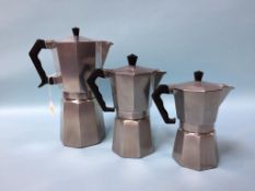 Three graduated Italian coffee pots