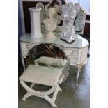 A cream dressing table and stool
