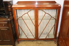 A walnut china cabinet