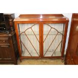 A walnut china cabinet