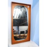 A teak framed mirror