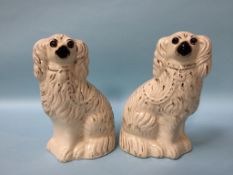 A pair of 19th century Staffordshire Spaniels