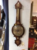 A rosewood wheel barometer, inlaid with mother of pearl