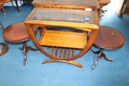 A modern glass topped table and a pair of reproduction tripod tables