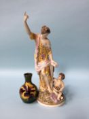 A 19th century German porcelain figure of a Lady with her arm aloft, stamped 'Hoffnung', 28cm