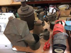 Various petrol and oil cans etc.