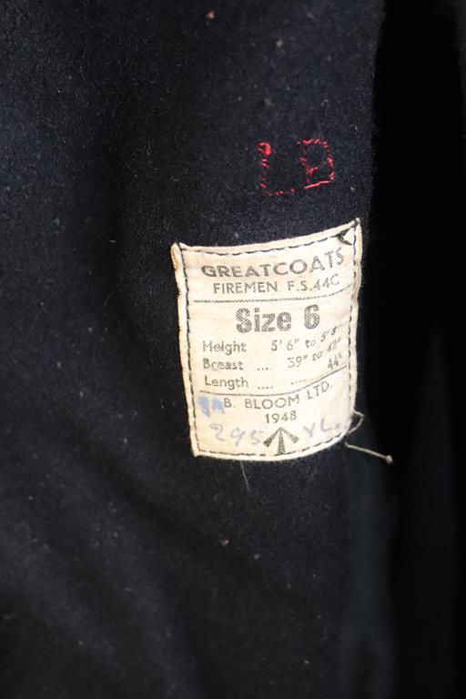 A Fireman's wool great coat and hat, Oxfordshire County Fire Service - Image 2 of 2