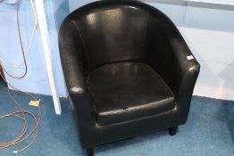 A black tub armchair