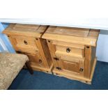 A pair of pine bedside cabinets