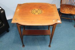 An Art Nouveau mahogany two tier occasional table