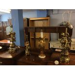 Four ornate gold coloured table lamps