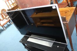 An LG TV and stand