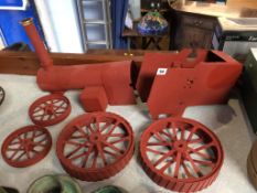 A part metal work traction engine, to include body and wheels