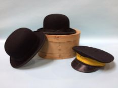 Two bowler hats and a cap