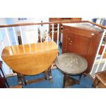 An oak corner cabinet, gateleg table and a brass topped table