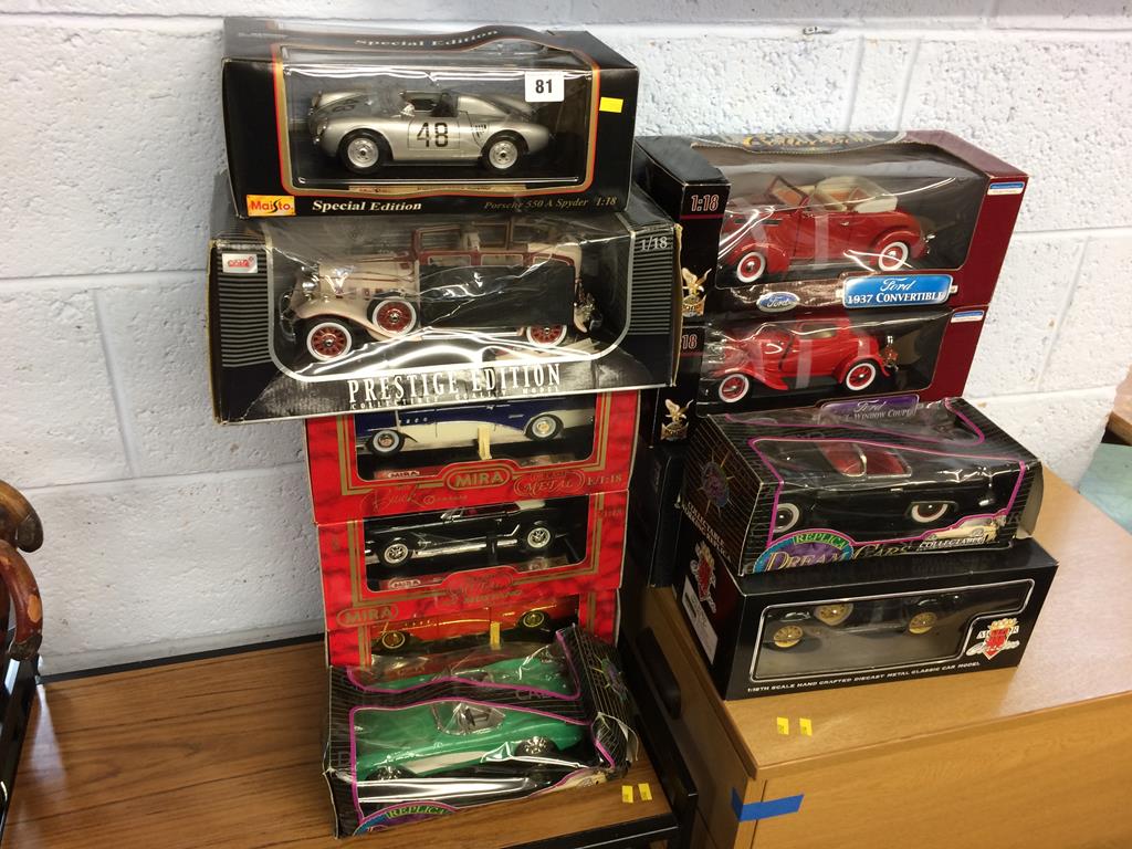 Eleven boxed die cast cars