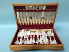 An oak cased canteen of cutlery