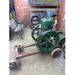 A large R. A. Lister and Co. Ltd stationary engine, with magneto