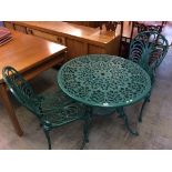 A green metal patio set